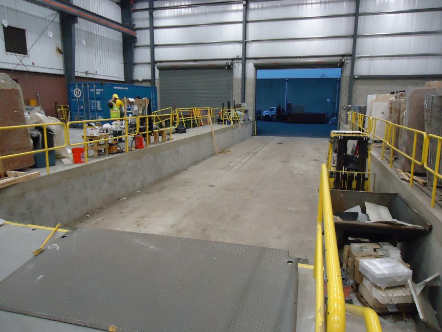 Prompt: A modern logistics warehouse interior with autonomous robots sorting packages in a clean, high-tech environment. Deep gray and bright orange color palette. Photorealistic, cinematic lighting.